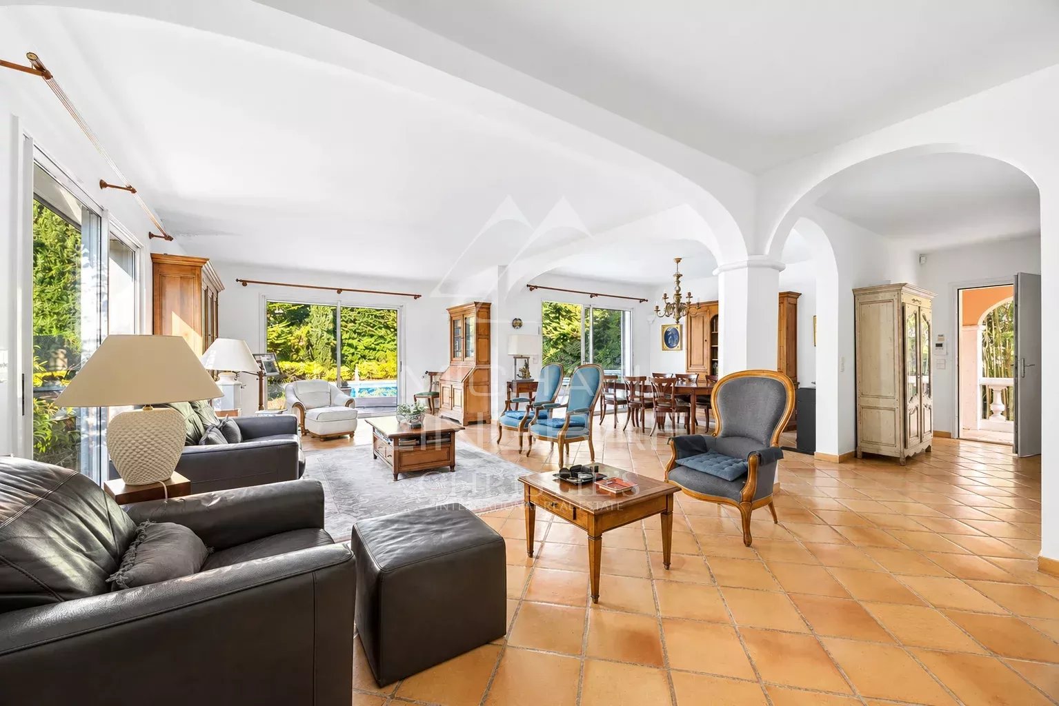 Interior of a house in Antibes Interior of a spacious house with living room, dining room and access to the terrace.