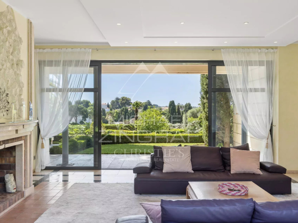 Interior of a contemporary villa overlooking a landscaped garden in Cap d'Antibes.