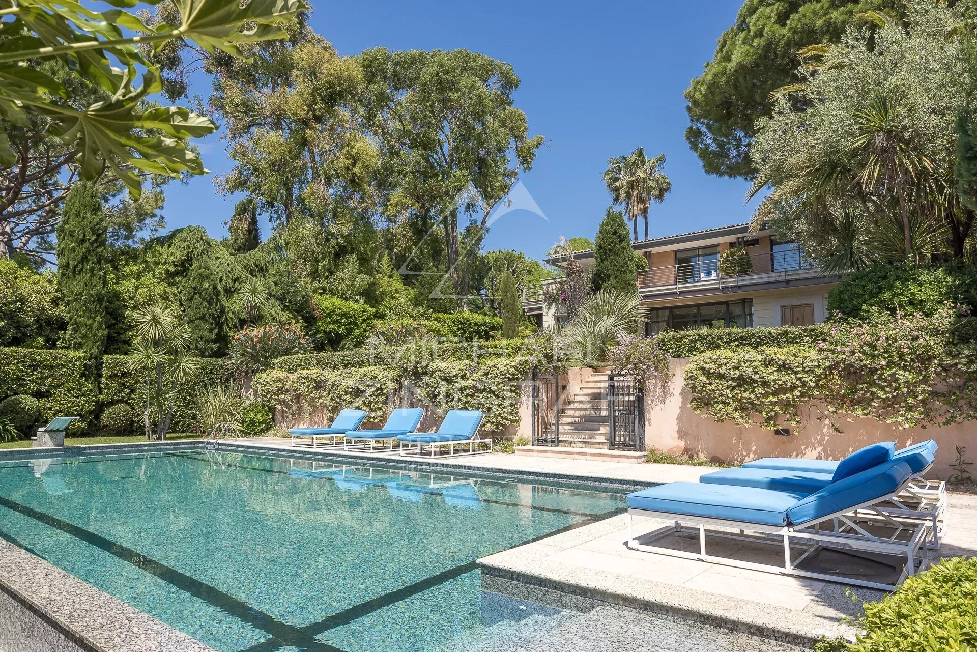 Contemporary villa in Cap d'Antibes Contemporary villa with swimming pool and landscaped garden in Cap d'Antibes.