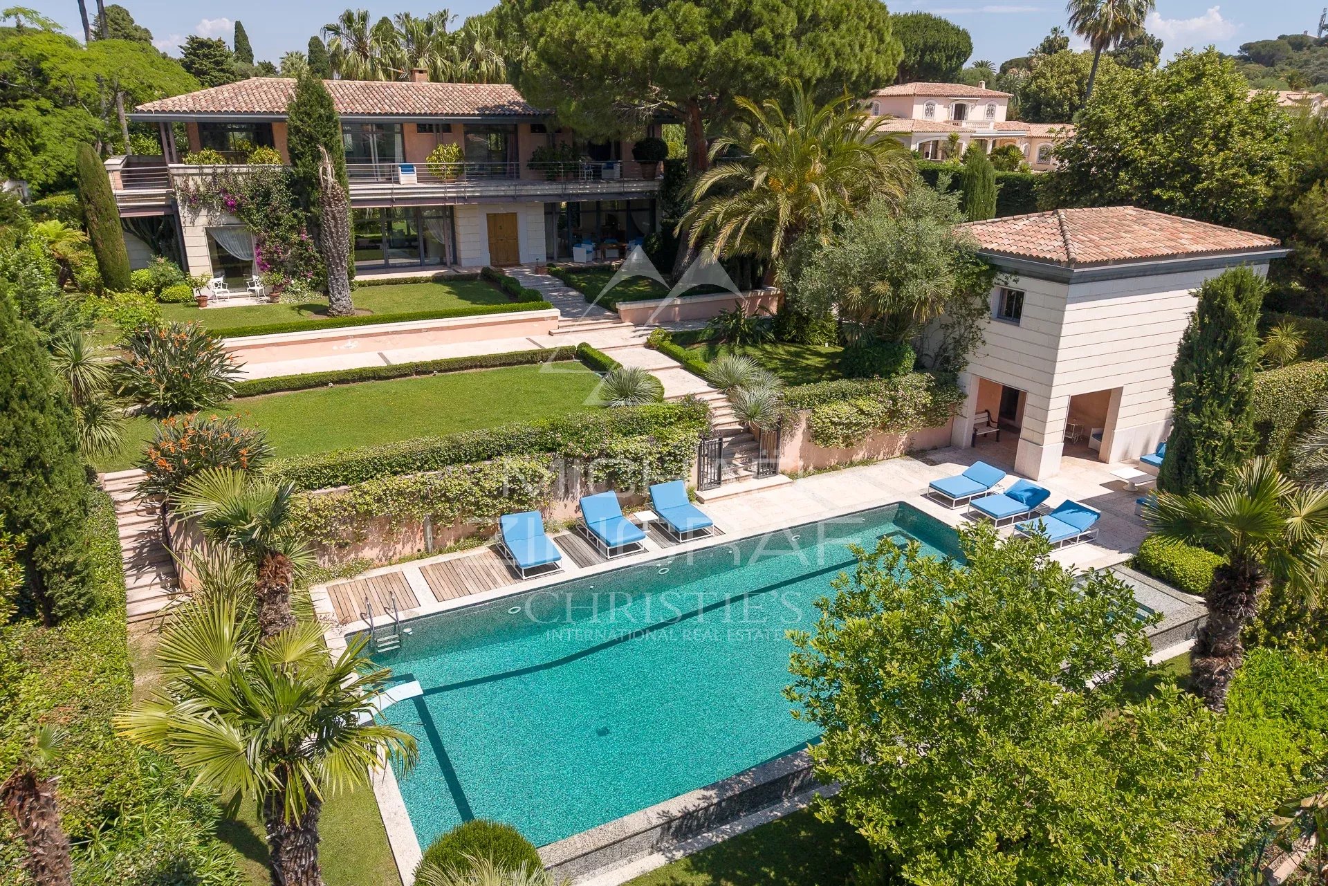 Contemporary villa in Cap d'Antibes Aerial view of a contemporary villa with swimming pool and garden in Cap d'Antibes.