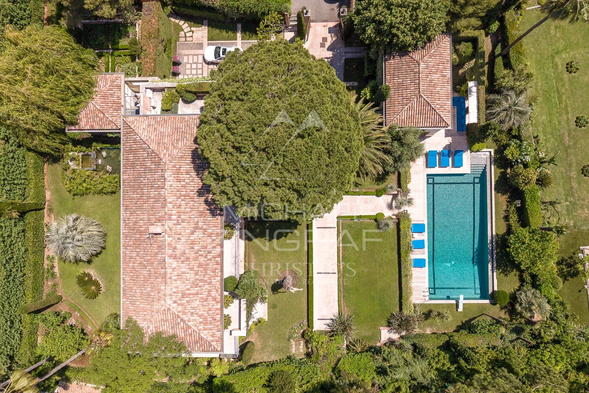 Contemporary villa in Cap d'Antibes Aerial view of a contemporary villa with swimming pool and garden in Cap d'Antibes.