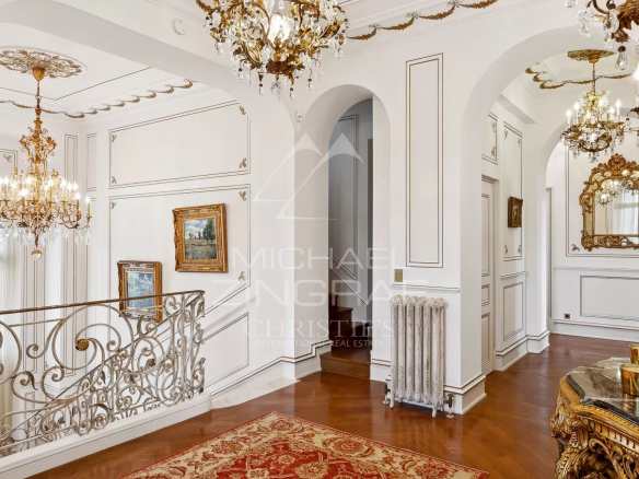 Interior of a Belle Époque style property with elegant architectural details.