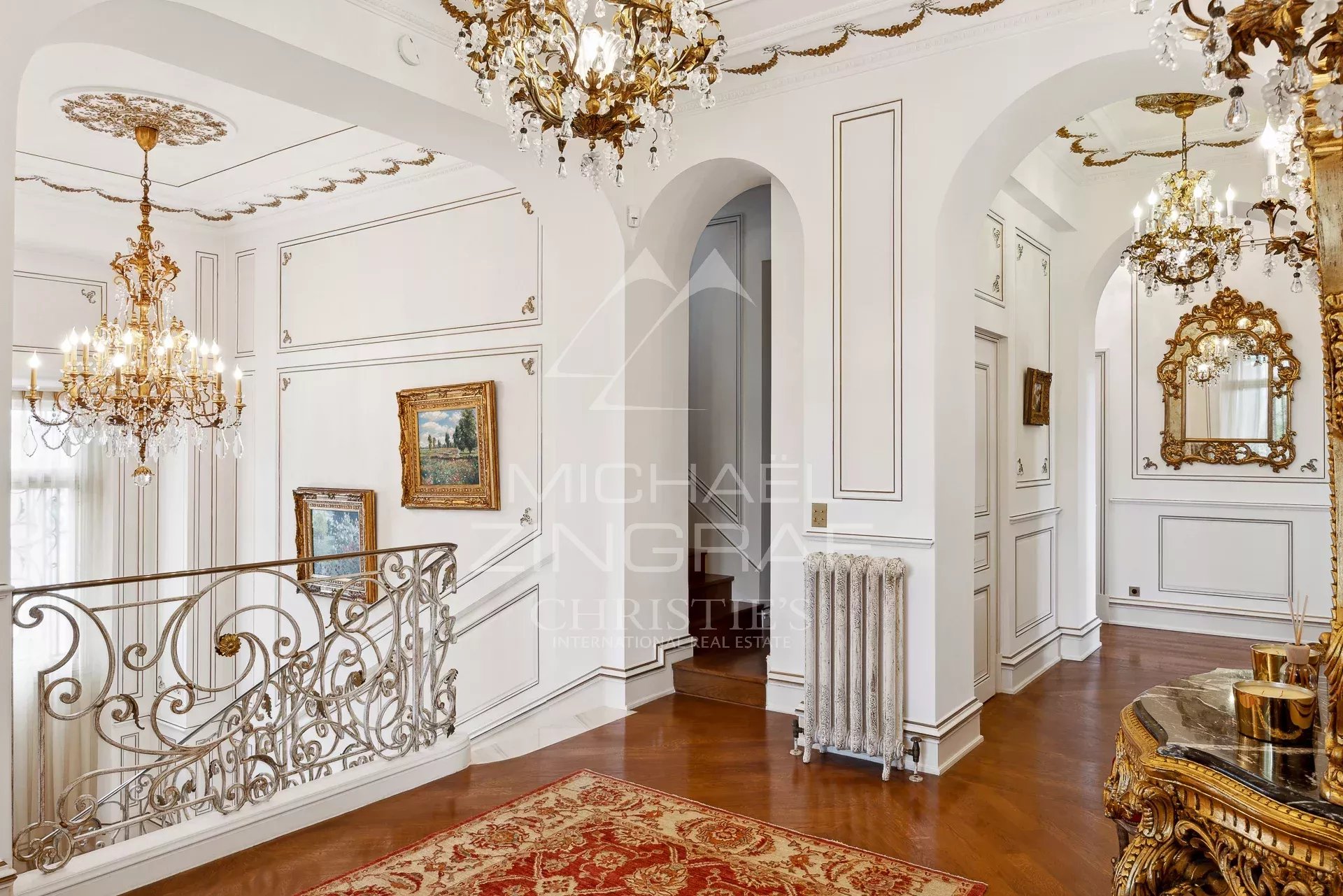 Interior of a Belle Époque style property with elegant architectural details.