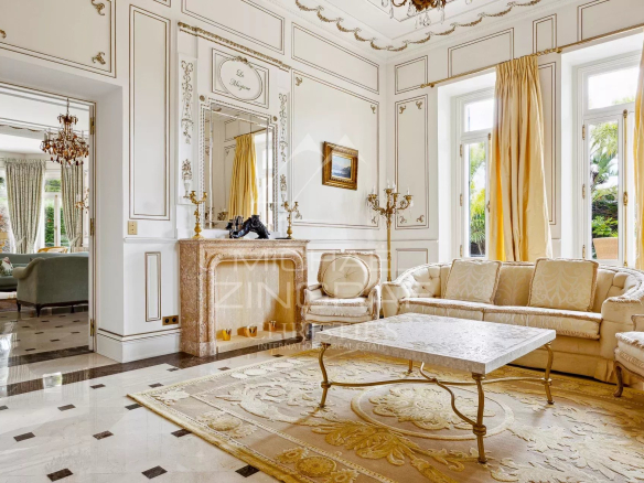 Interior of a Belle Époque style property with elegant living room and refined decoration.