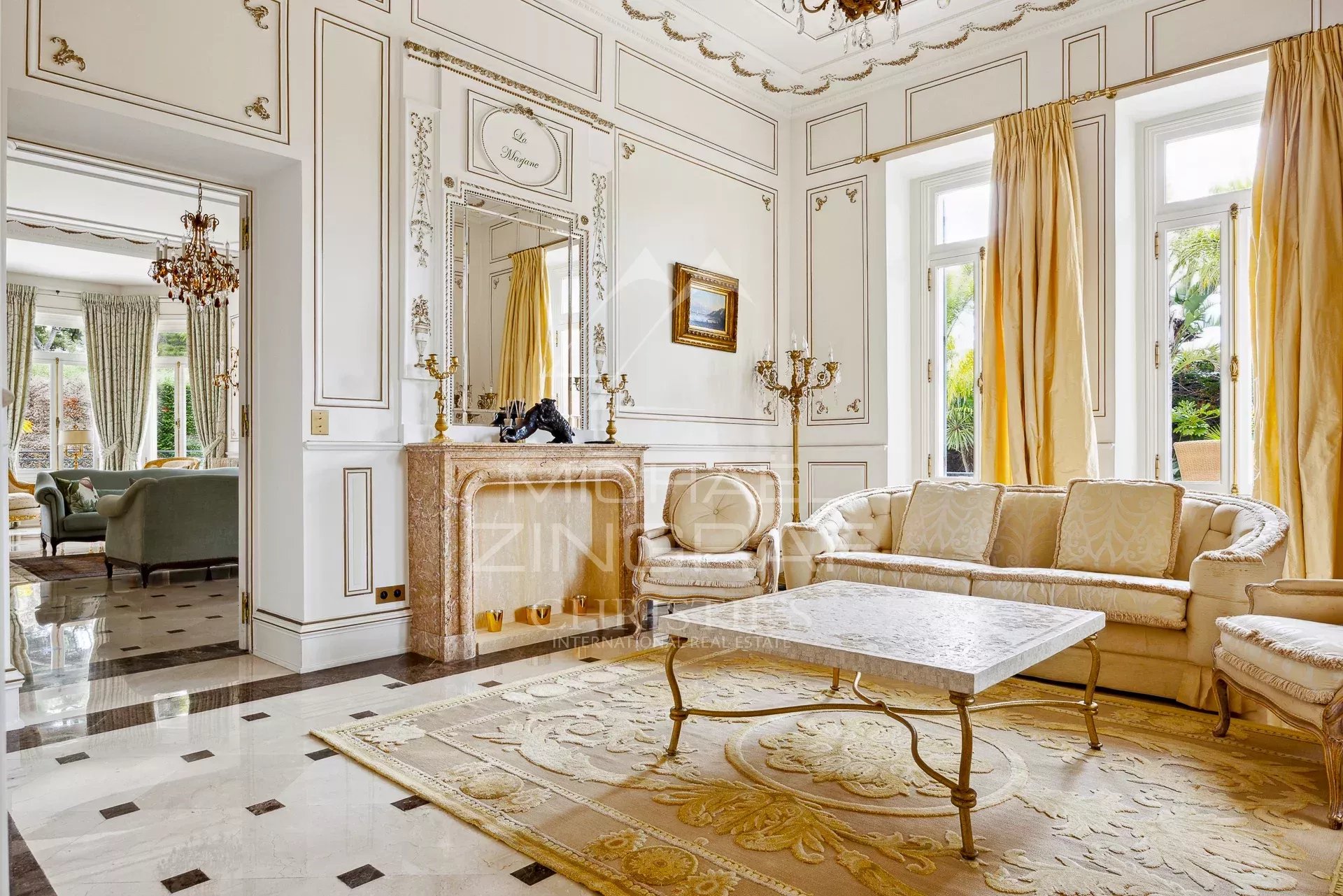Interior of a Belle Époque style property with elegant living room and refined decoration.