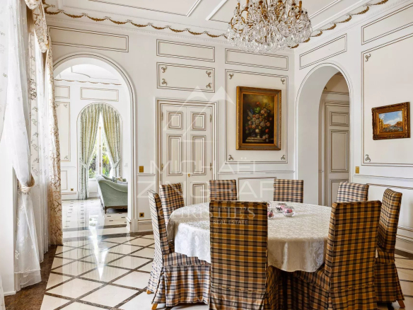 Interior of a Belle Époque property with elegant dining room and refined decor.