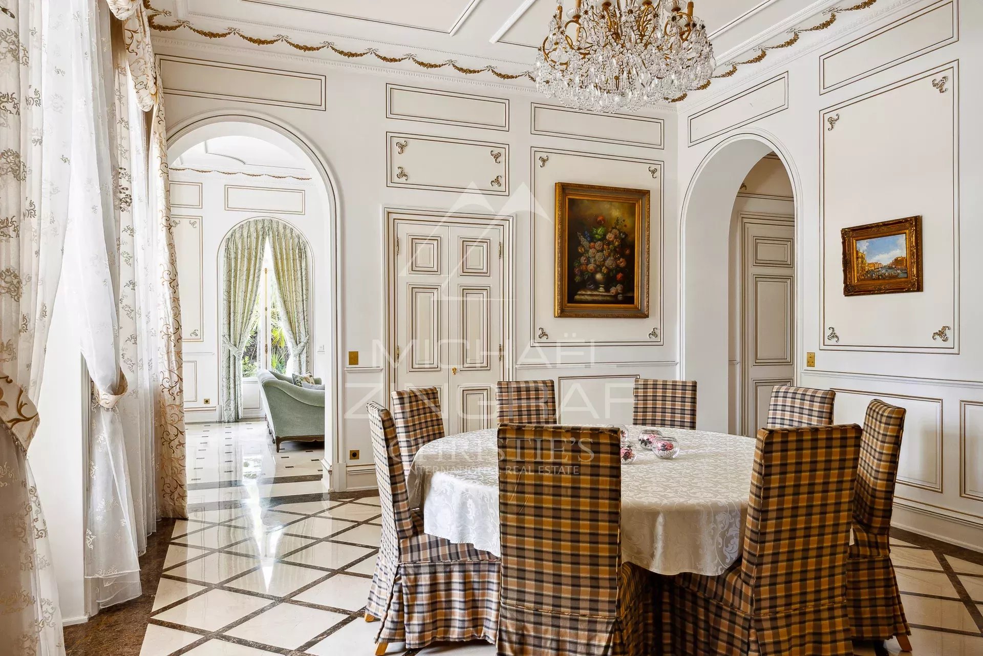 Interior of a Belle Époque property with elegant dining room and refined decor.