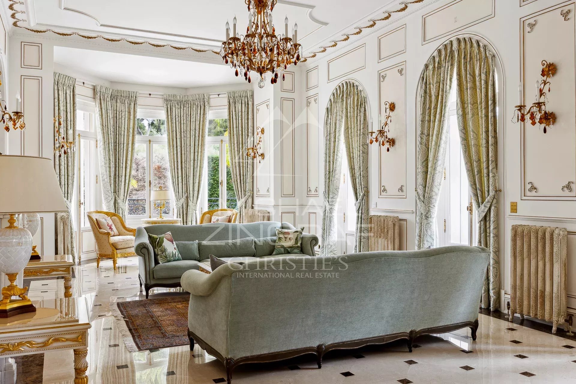 Interior of a Belle Époque property with a bright living room and elegant decor in Antibes.