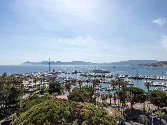 Panoramic view of the port of Cannes and the sea from a penthouse.