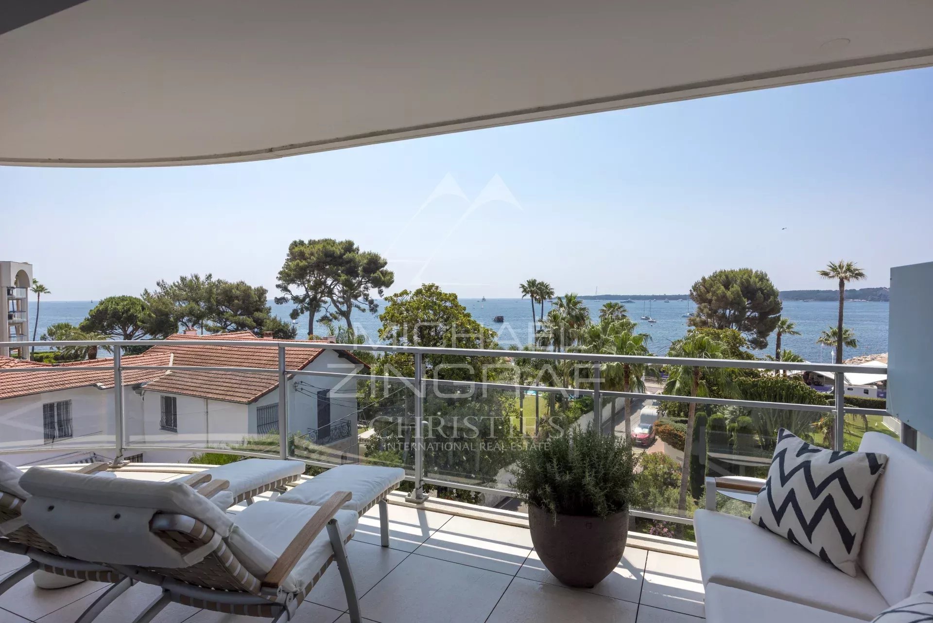 Apartment in Cannes with sea view Terrace of an apartment in Cannes with sea view and modern furniture.