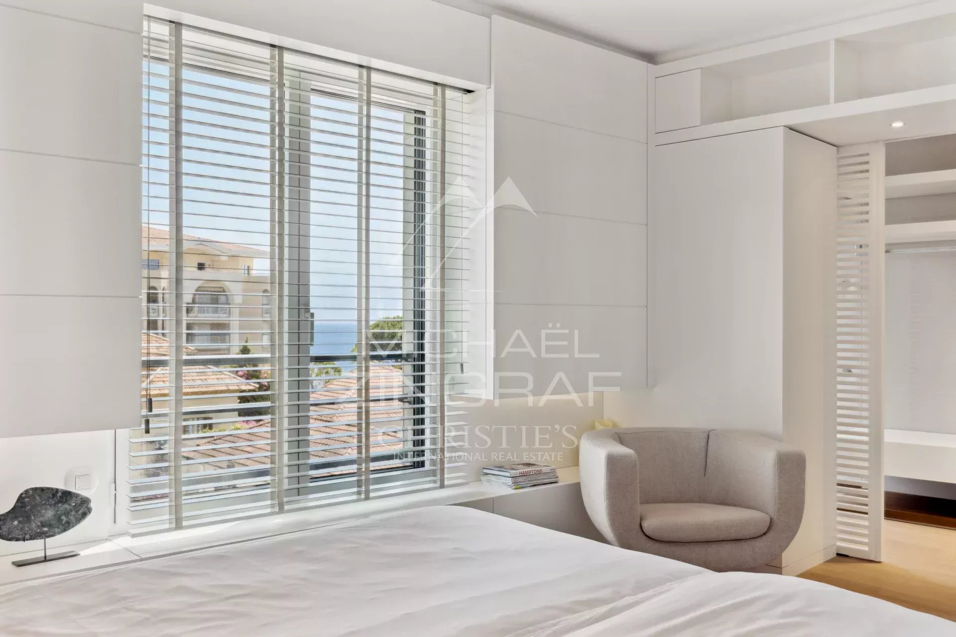 Apartment room in Cannes Apartment room in Cannes with shuttered windows and sea view.