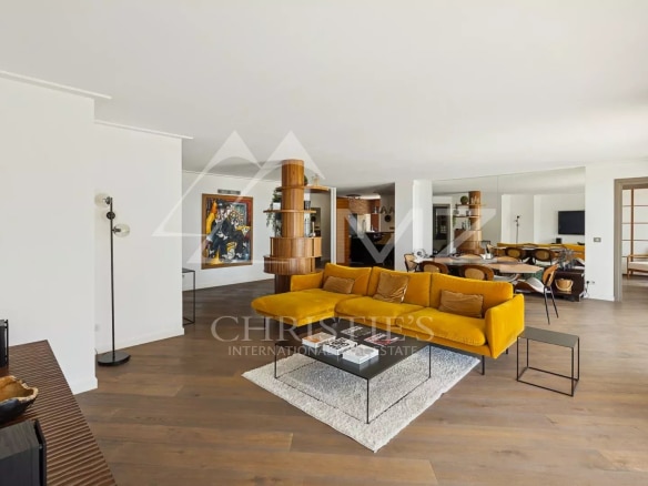 Interior of a modern apartment with a bright living room and contemporary decor.