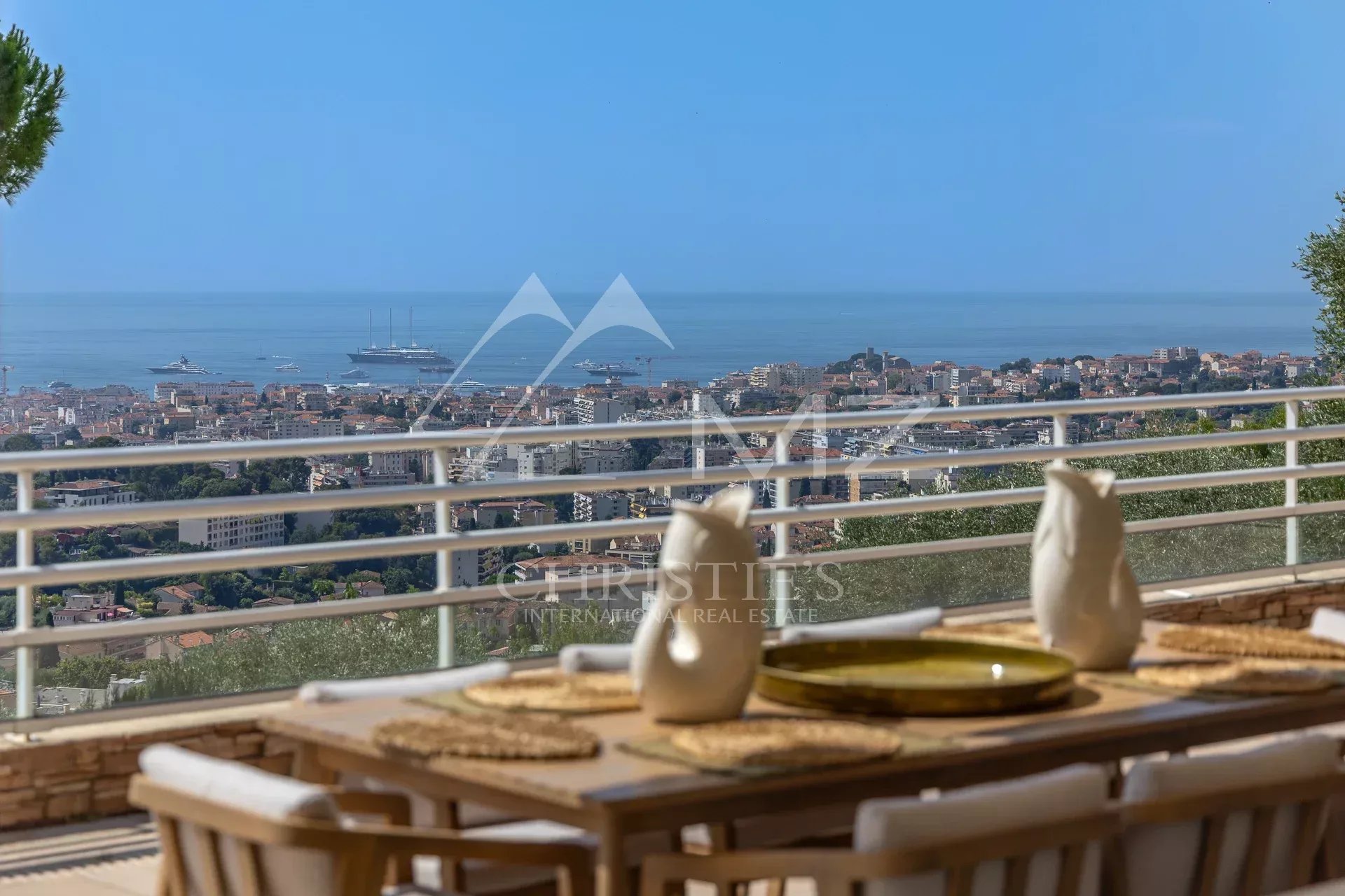 Apartment with sea view in Cannes Panoramic view of the Bay of Cannes from an apartment terrace in Le Cannet.