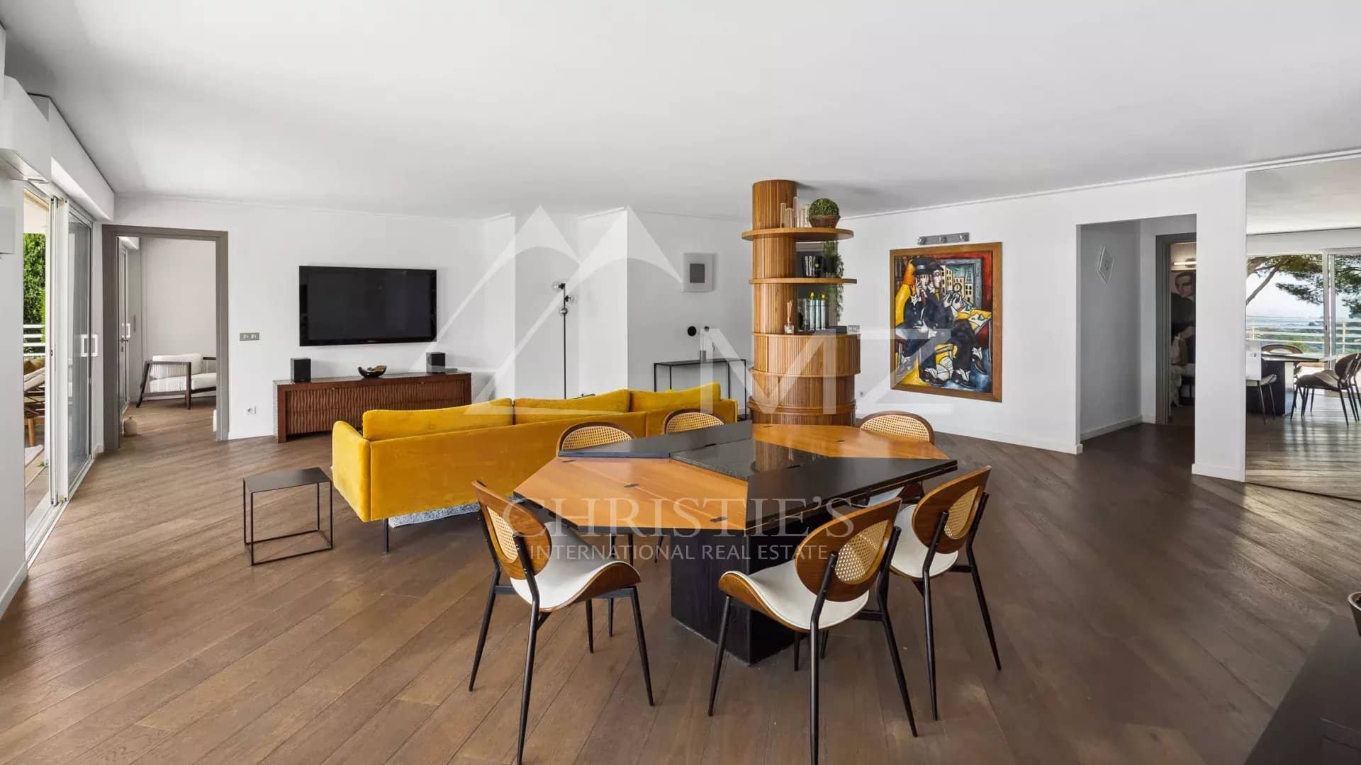 Modern apartment with sea view in Le Cannet Interior of a modern apartment with living room, dining room and sea view.