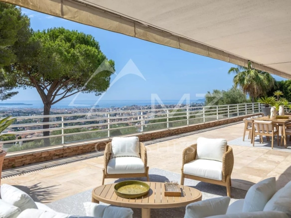 Apartment terrace with panoramic views of the Bay of Cannes and the Mediterranean.