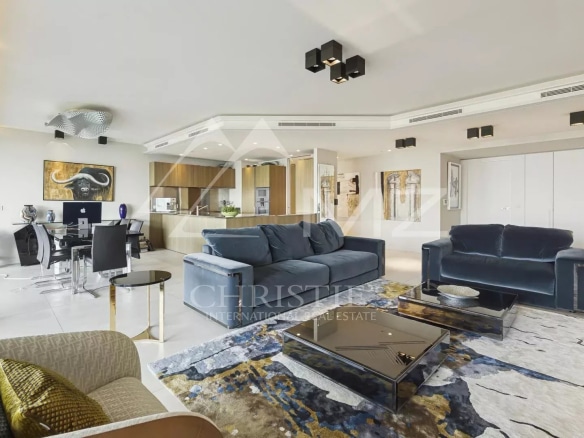 Modern living room in a contemporary apartment with designer furniture and minimalist decor.