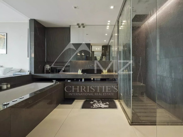 Modern bathroom with shower and sink in a contemporary apartment in Cannes