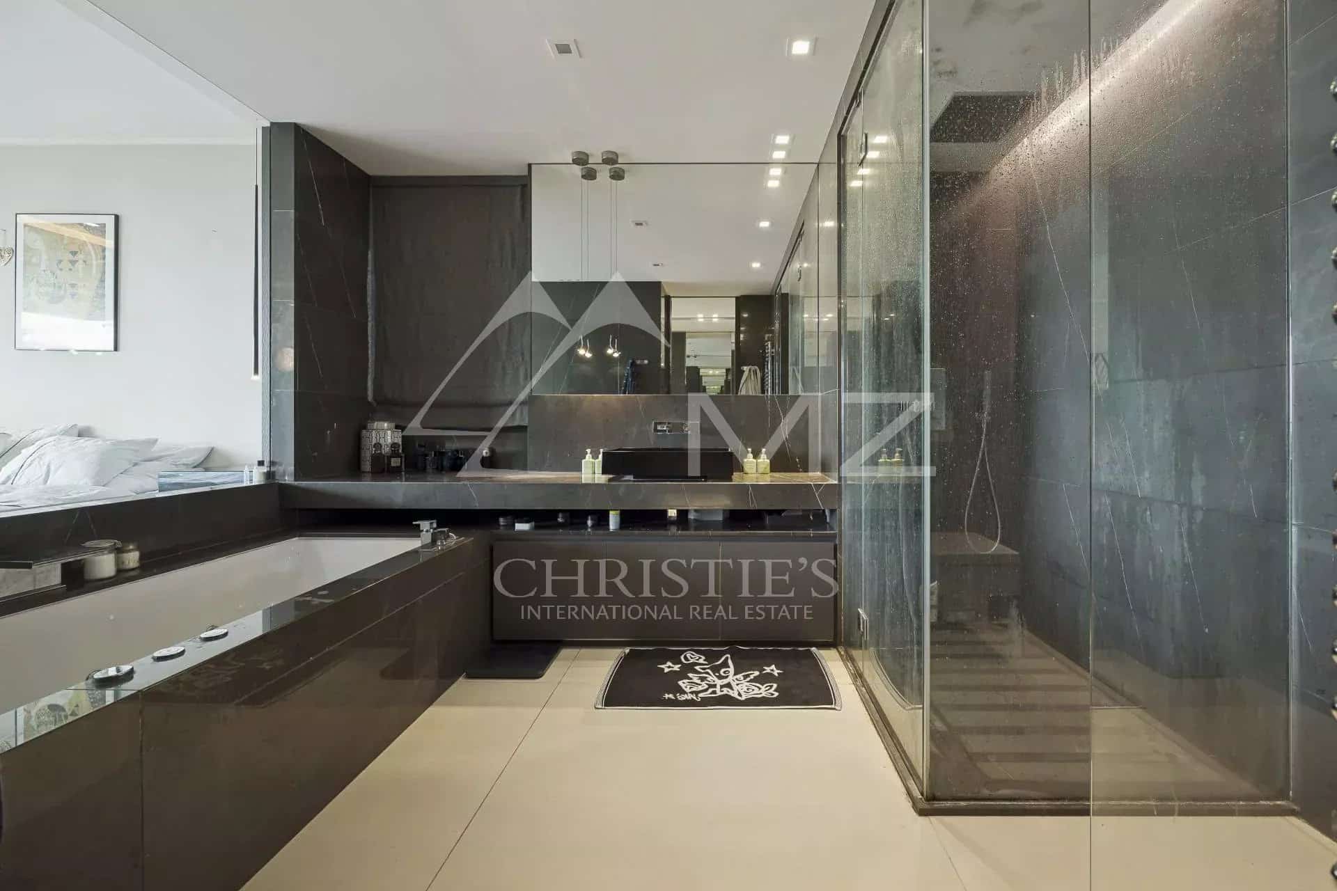 Modern bathroom with shower and sink in a contemporary apartment in Cannes