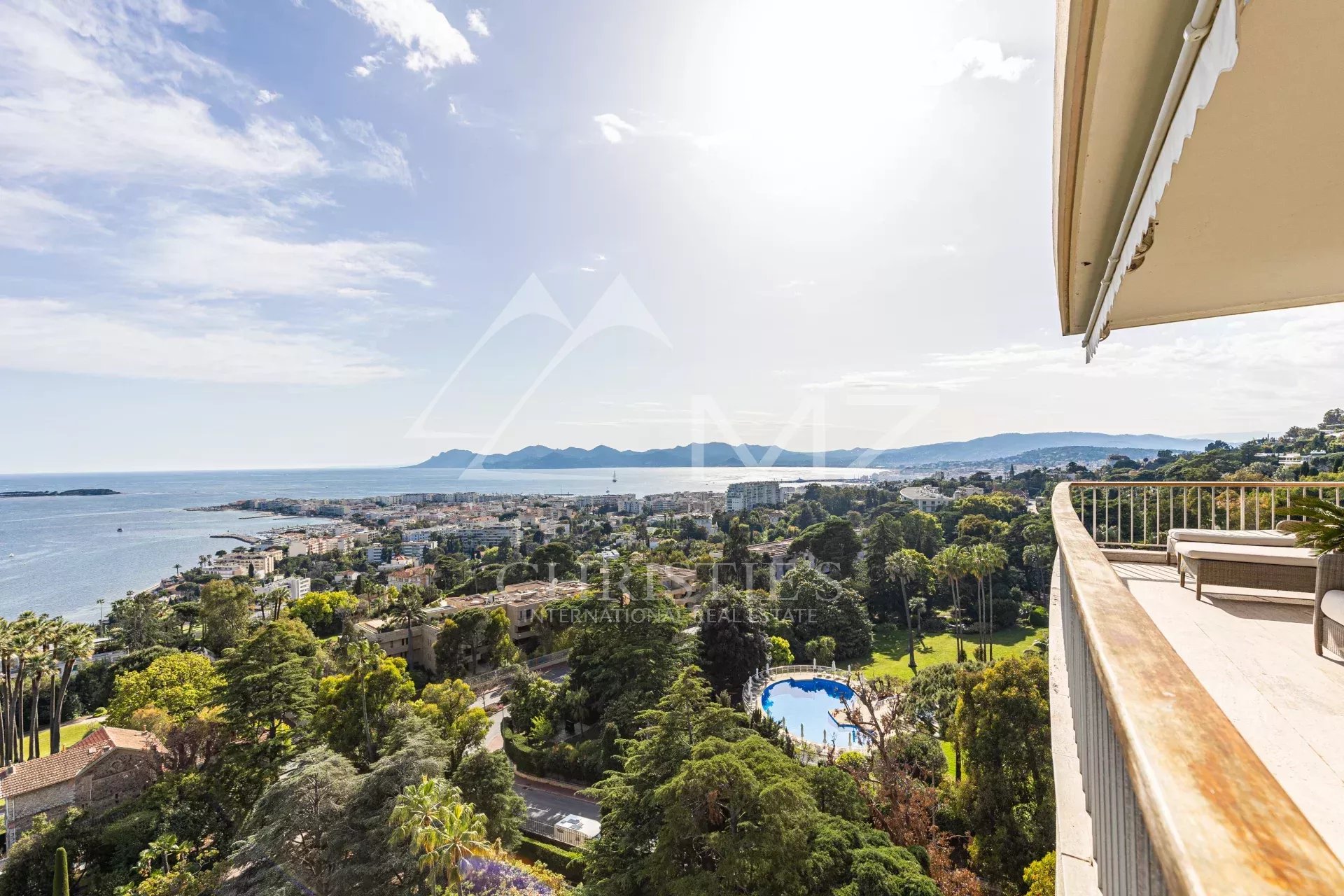 Panoramic view of the sea and the city of Cannes from a penthouse with terrace.