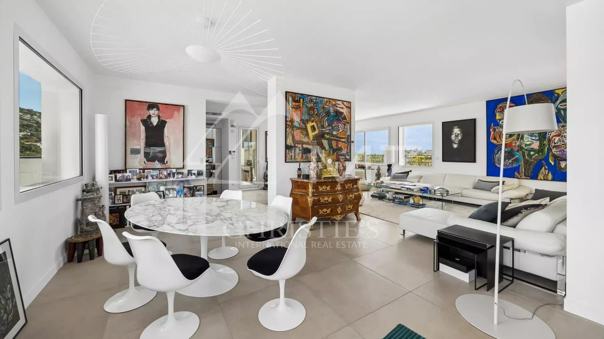 Interior of a rooftop villa in Cannes with a bright living room and modern decor.