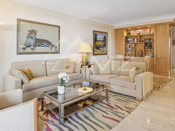 Living room of a contemporary apartment with modern furniture and elegant decor.