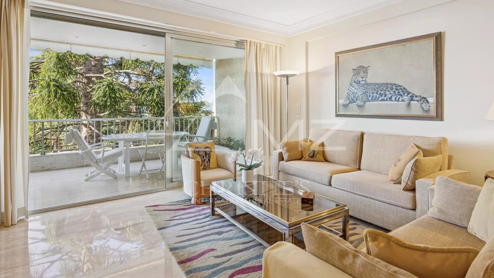 Contemporary apartment in Cannes Interior of a contemporary apartment in Cannes with a bright living room and access to a terrace.