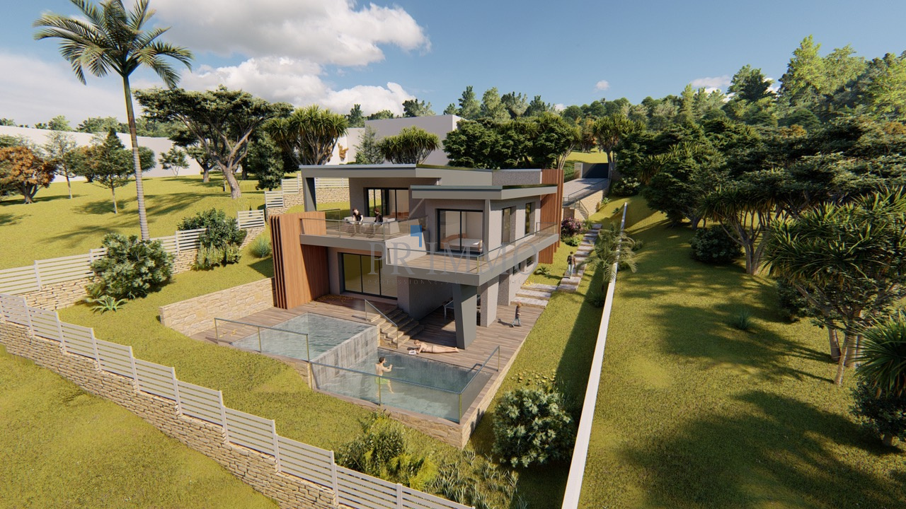 Terrain à bâtir aux Issambres Vue aérienne d'un terrain à bâtir avec projet de villa contemporaine et piscine aux Issambres.
