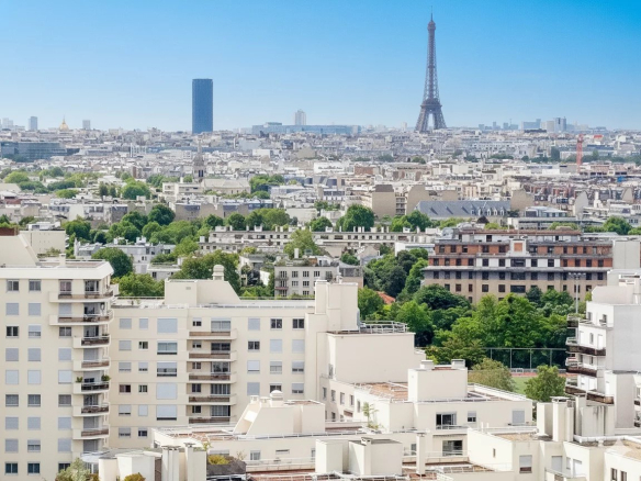 Panoramic view of Paris from a duplex in Courbevoie, with the Eiffel Tower in the background.