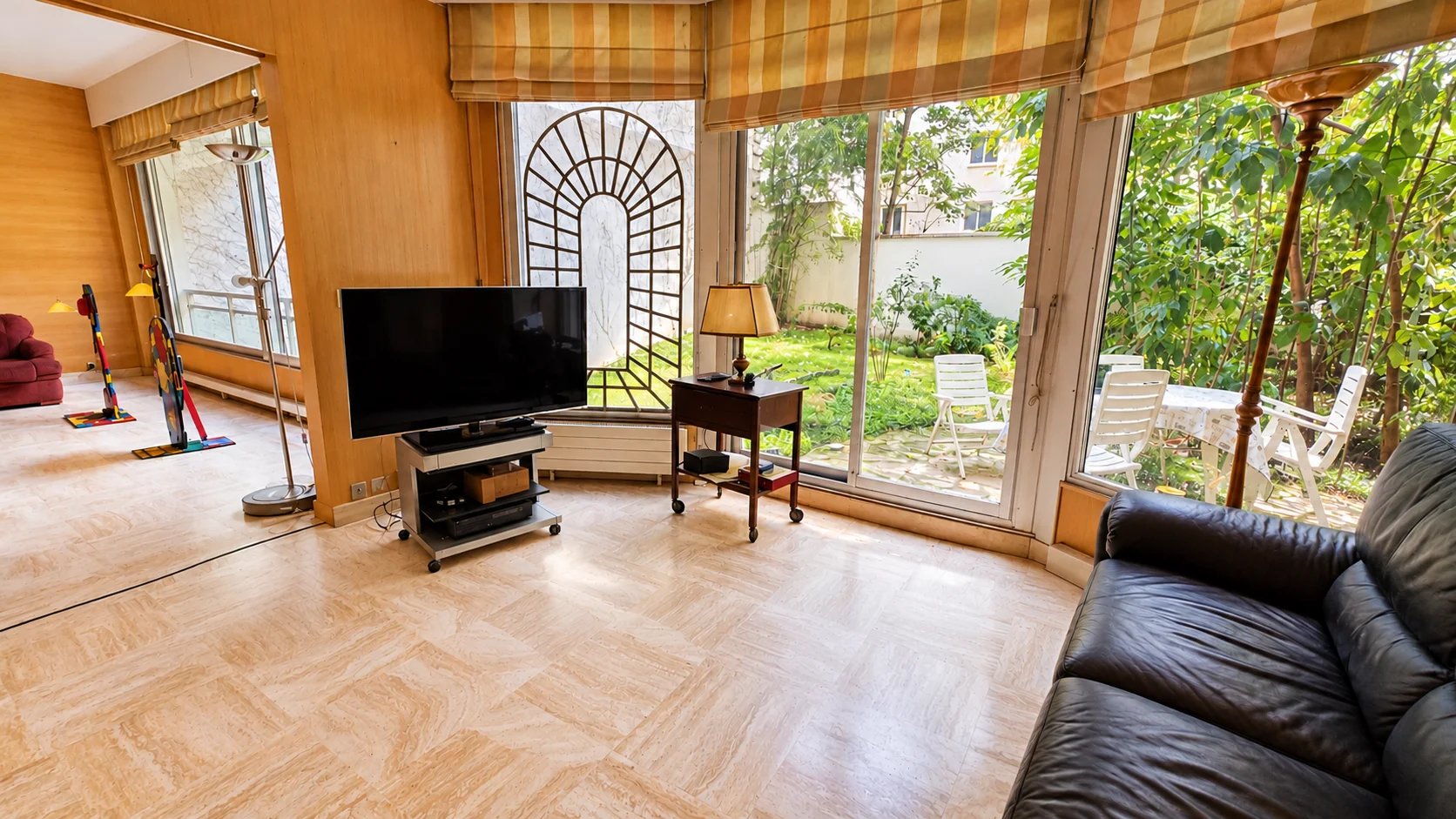 Family apartment in the 16th arrondissement of Paris Interior of a family apartment in the 16th arrondissement of Paris with a garden