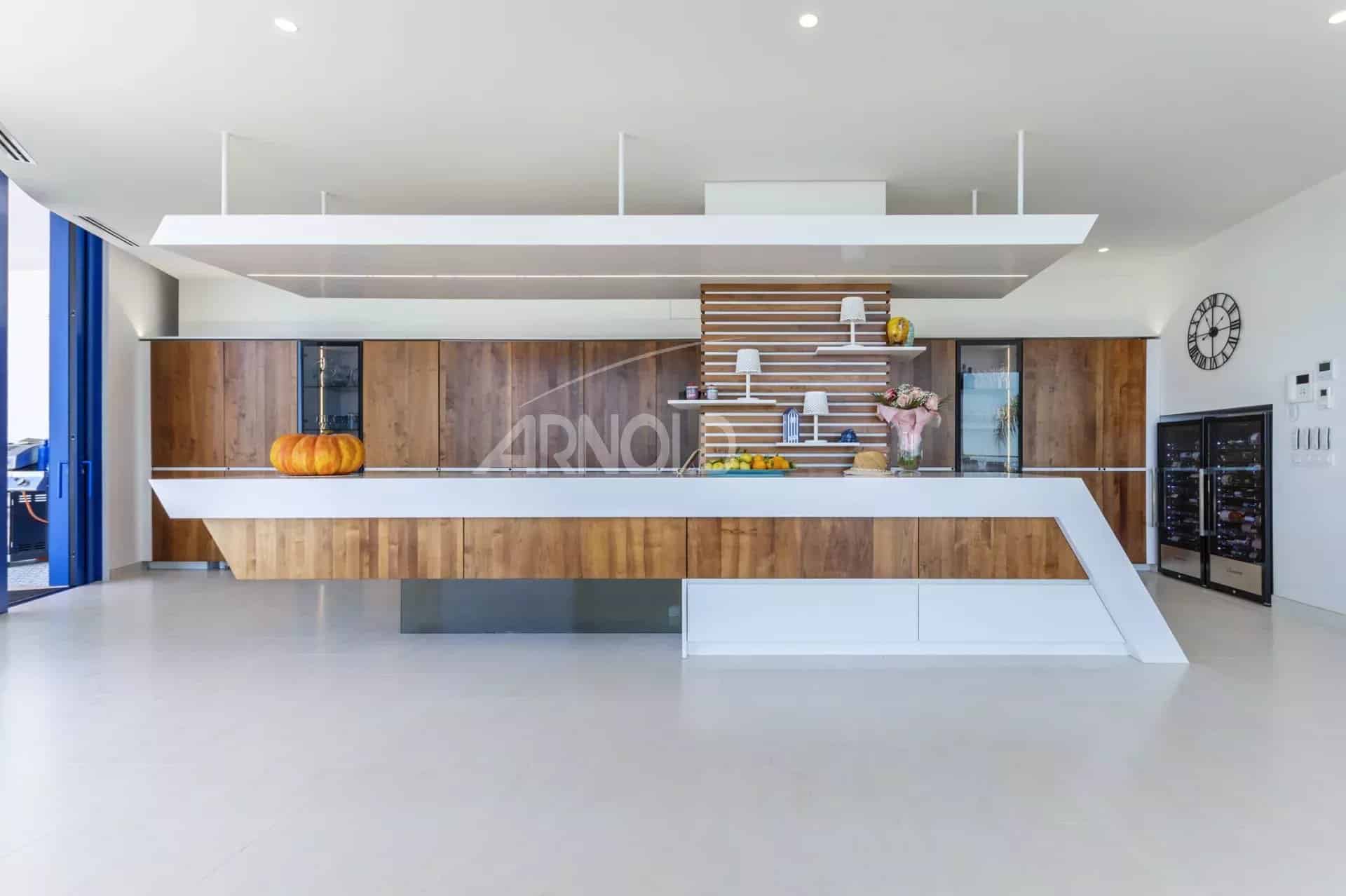 Modern and sleek kitchen in a villa in Calpe overlooking the Mediterranean Sea.