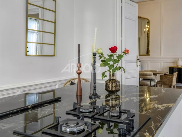 Interior of a private mansion in Ancenis with modern kitchen and contemporary decorative elements.
