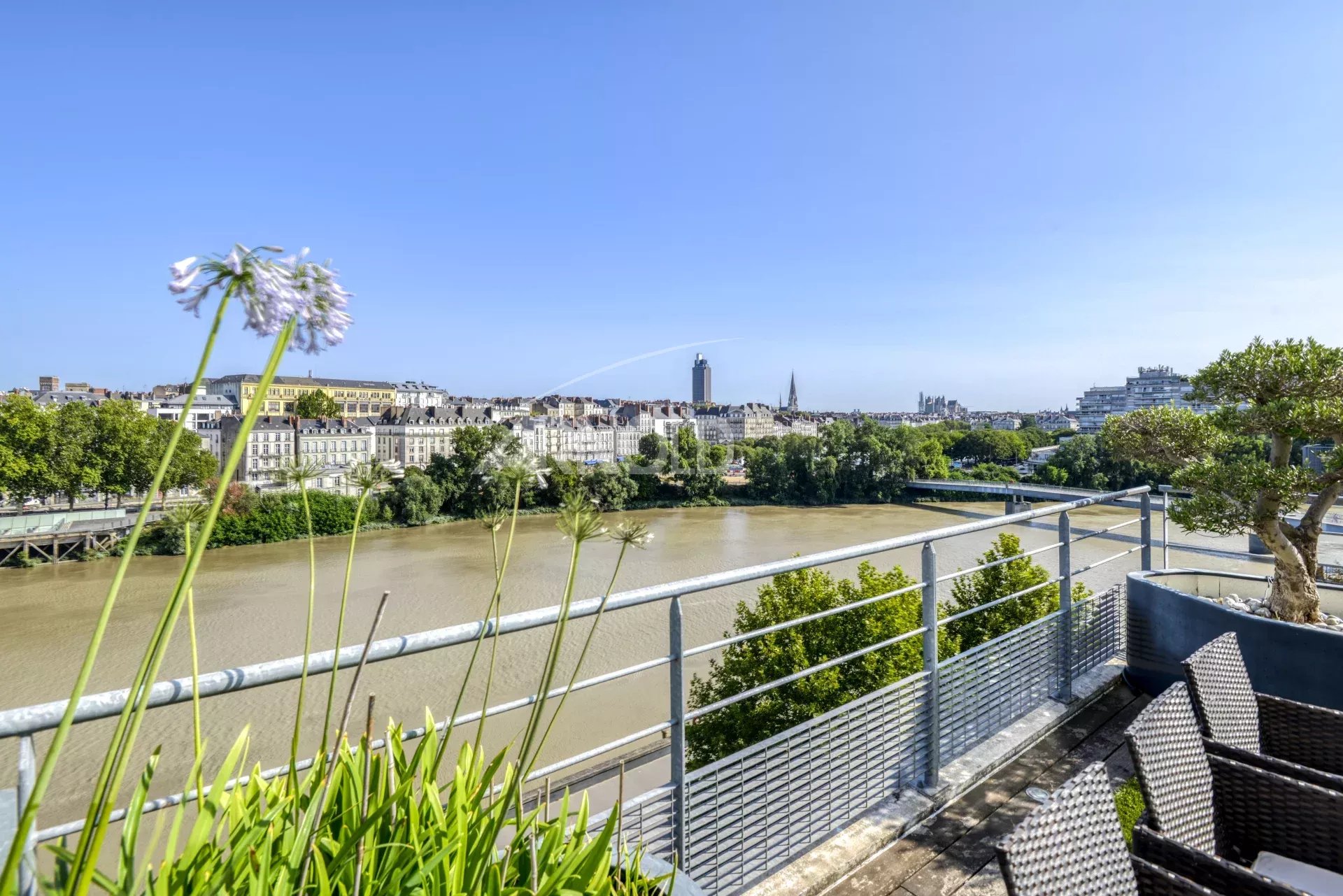 Panoramic view of the Loire and Nantes from a top floor duplex with terrace.