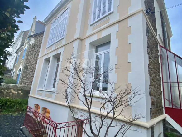 Stone bourgeois house with garden in Saint-Malo, exterior view.