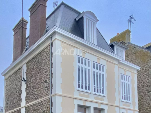 Stone bourgeois house with garden in Saint-Malo, exterior view.
