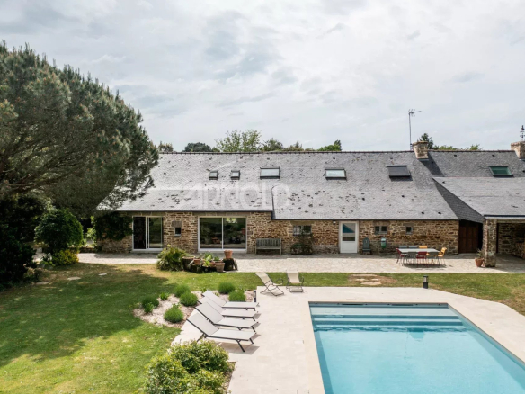 Stone farmhouse with swimming pool in a wooded garden in Baden.