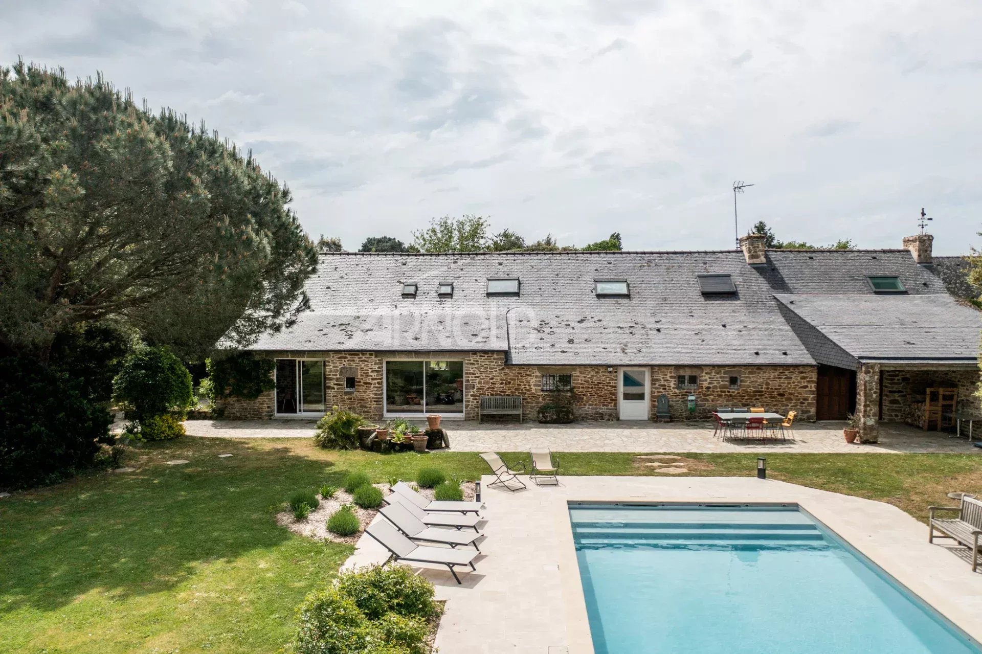 Stone farmhouse with swimming pool in Baden Stone farmhouse with swimming pool in a wooded garden in Baden.