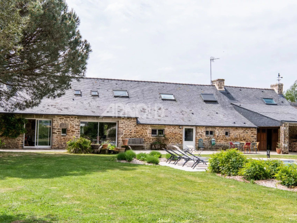 Stone farmhouse with swimming pool in a wooded garden in Baden.