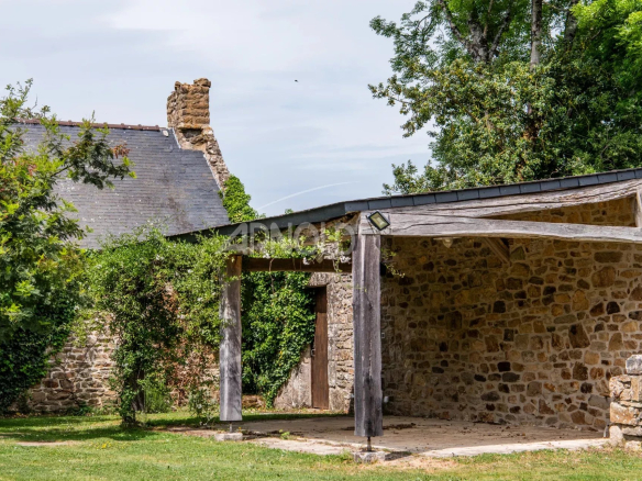 Stone farmhouse with swimming pool in a peaceful hamlet in Baden, surrounded by a wooded garden.