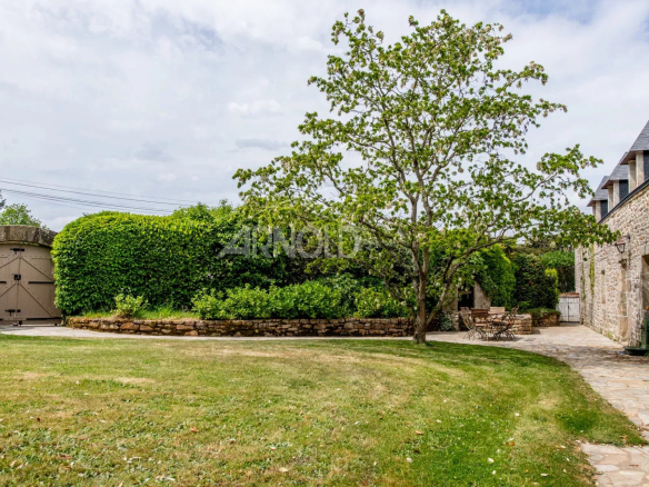 Stone farmhouse with wooded garden and swimming pool, located in Baden.