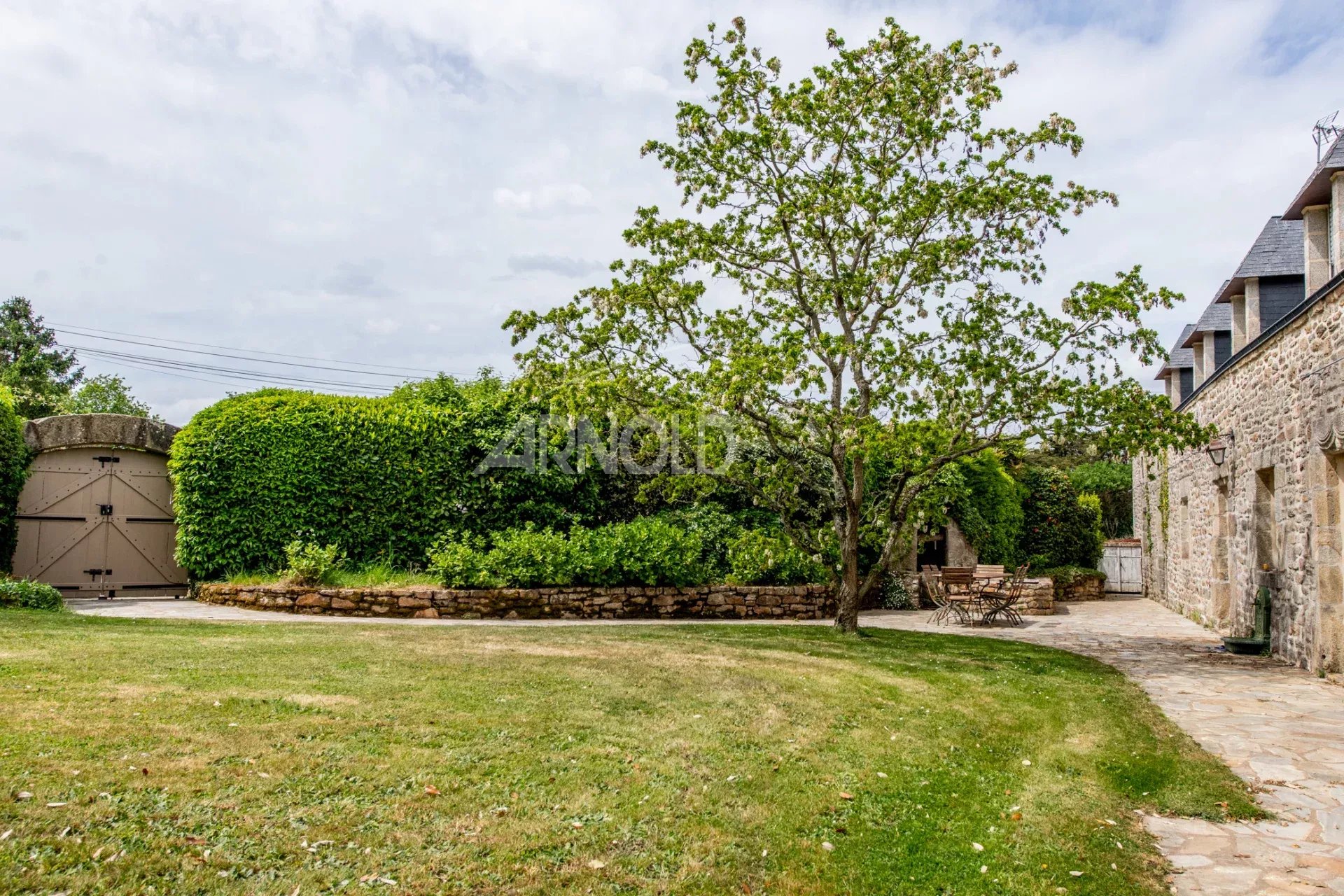 Long farmhouse with swimming pool in Baden Stone farmhouse with wooded garden and swimming pool, located in Baden.