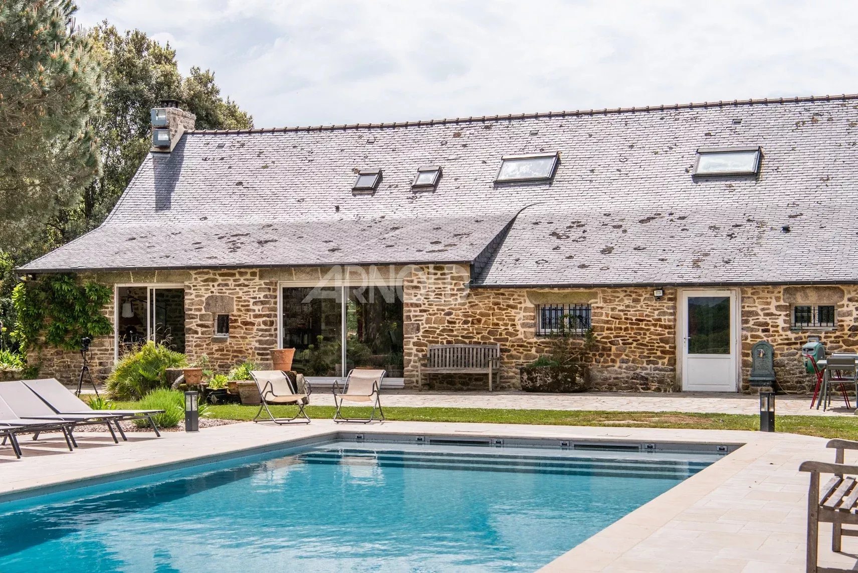Stone farmhouse with swimming pool in Baden Stone farmhouse with swimming pool, garden and countryside views in Baden.