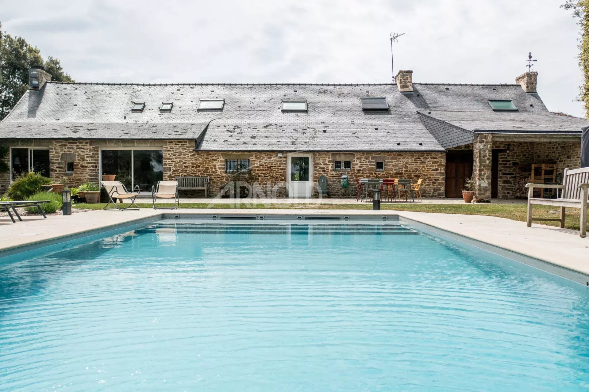Stone farmhouse with swimming pool Stone farmhouse with swimming pool, garden and countryside views in Baden.