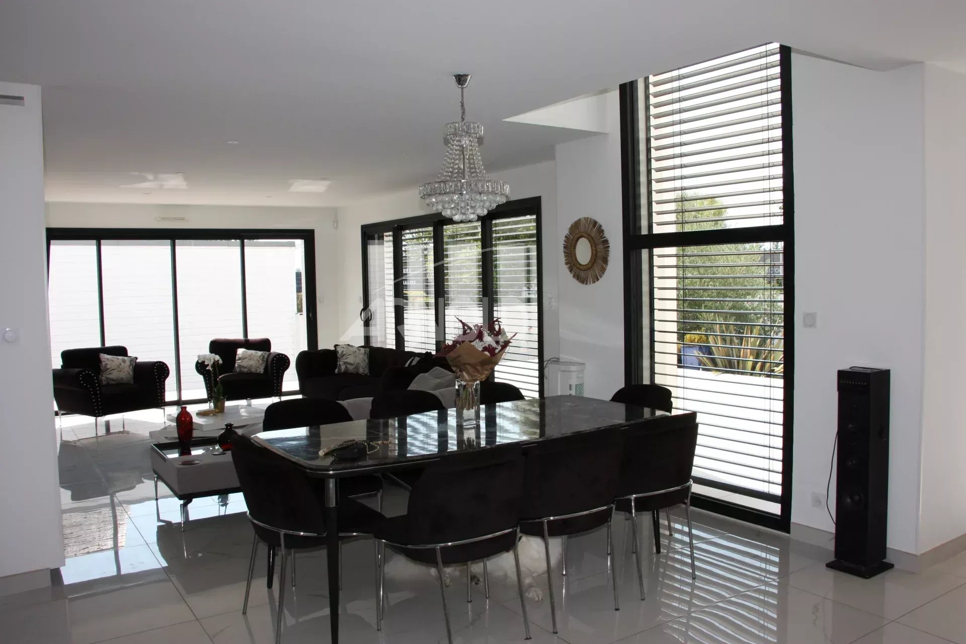 Interior of a contemporary villa in Vannes Interior of a contemporary villa with a bright living and dining area.