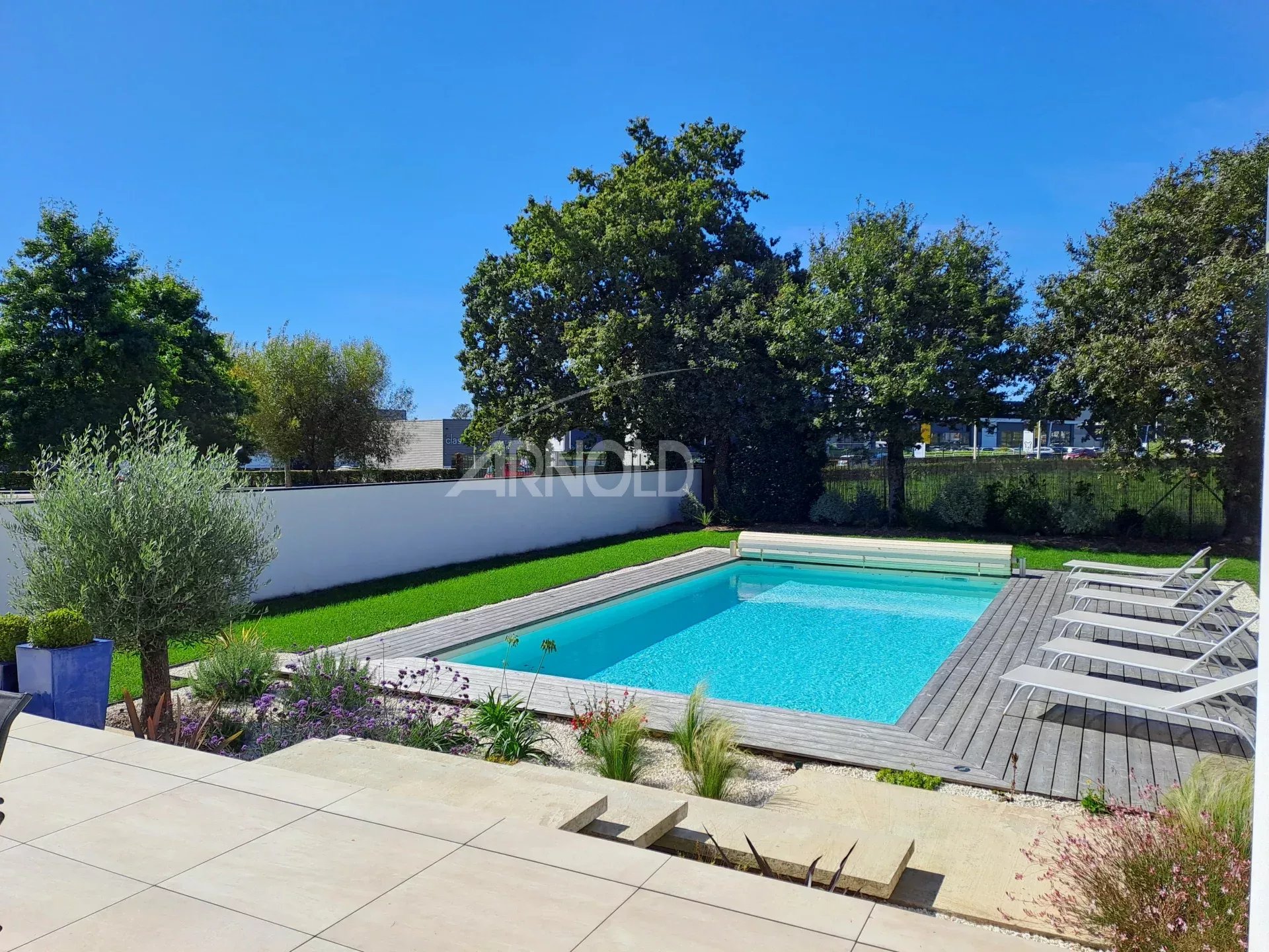 Contemporary villa in Vannes Contemporary villa with heated swimming pool on landscaped grounds in Vannes.