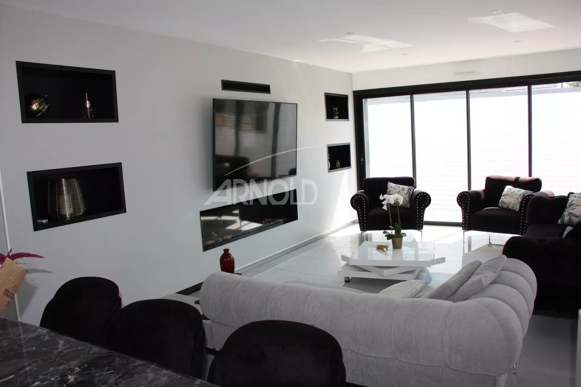 Living room of a contemporary villa in Vannes Interior of a contemporary villa in Vannes with a bright and modern living room.