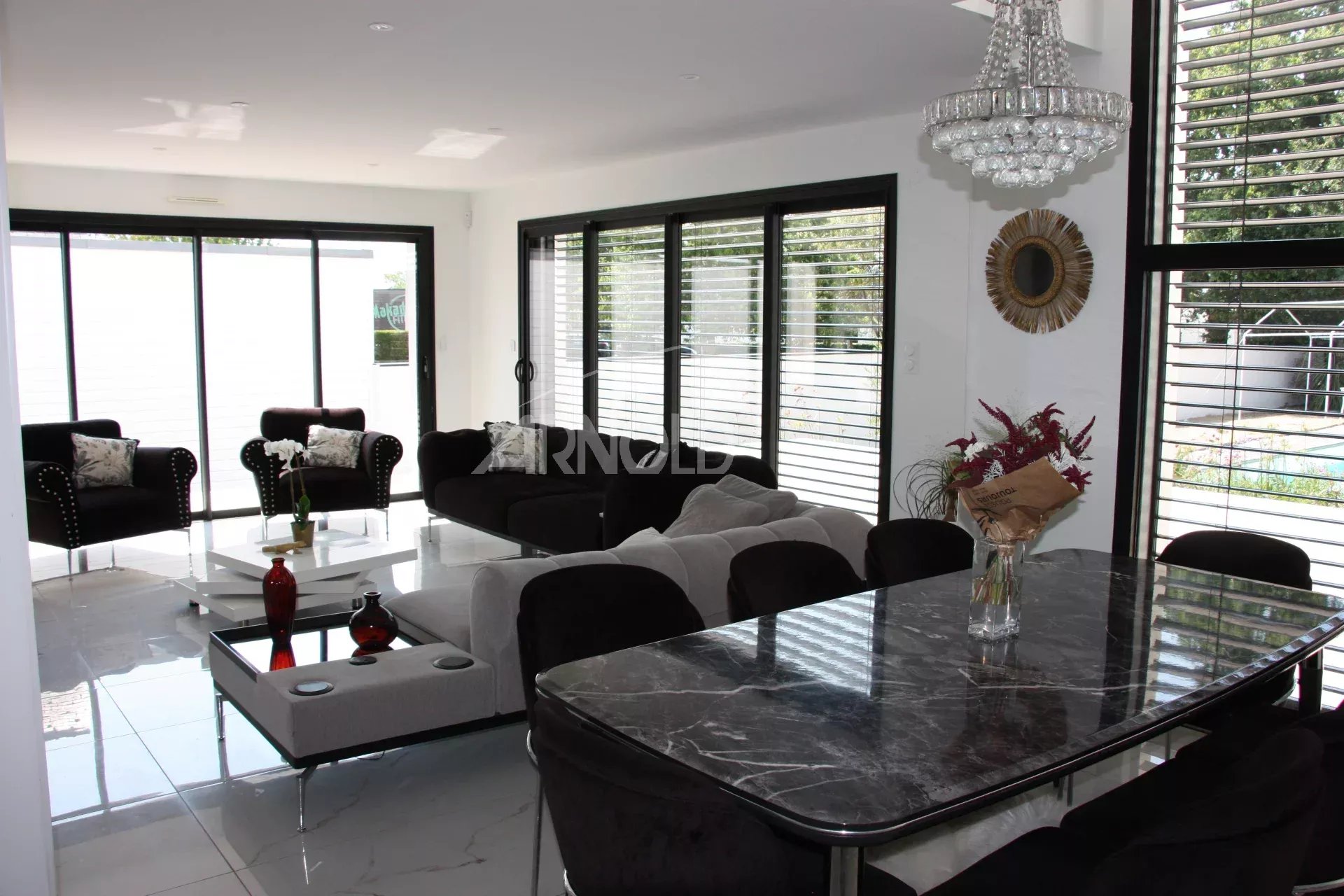 Interior of a contemporary villa Interior of a contemporary villa in Vannes, with a bright living room and dining room.