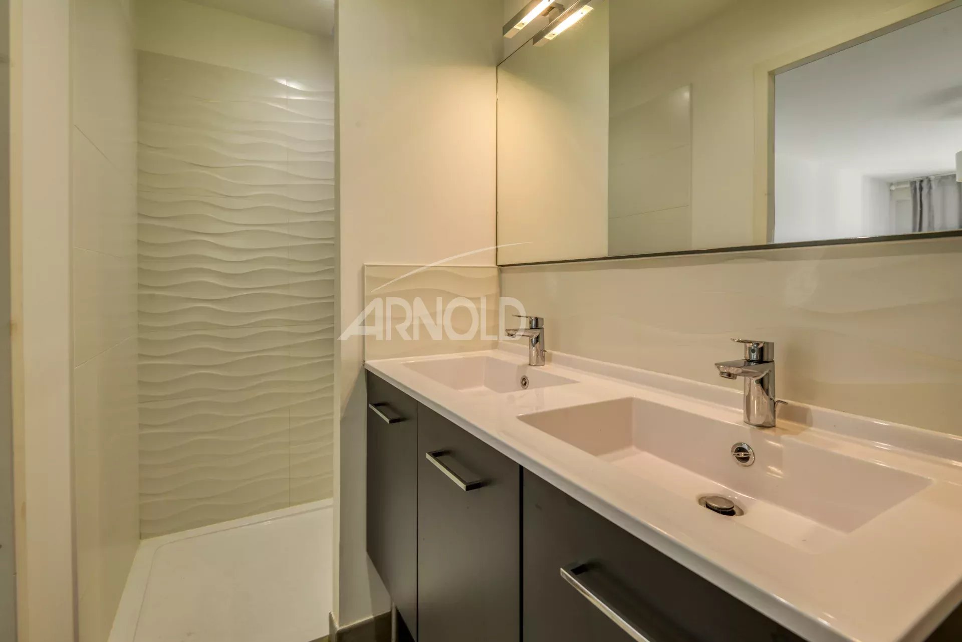 Contemporary bathroom Modern bathroom with shower and double sink.