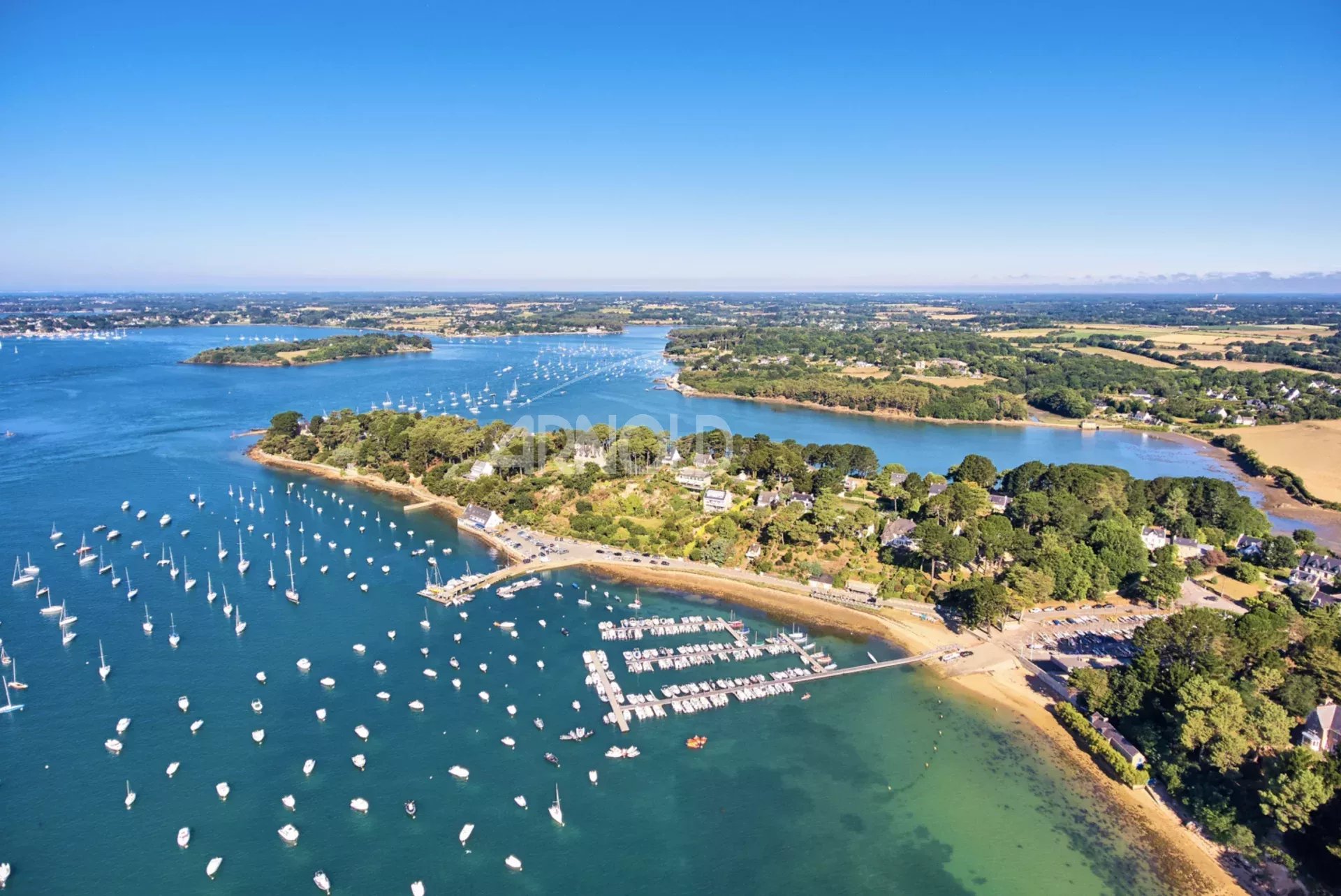 Aerial view of the Gulf of Morbihan Aerial view of the Gulf of Morbihan with boats and green landscapes.