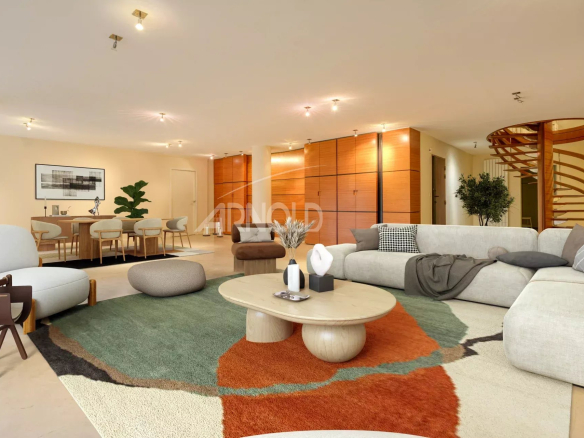 Interior of a 7-room apartment in Nantes with a spacious living room, modern furniture and elegant decoration.