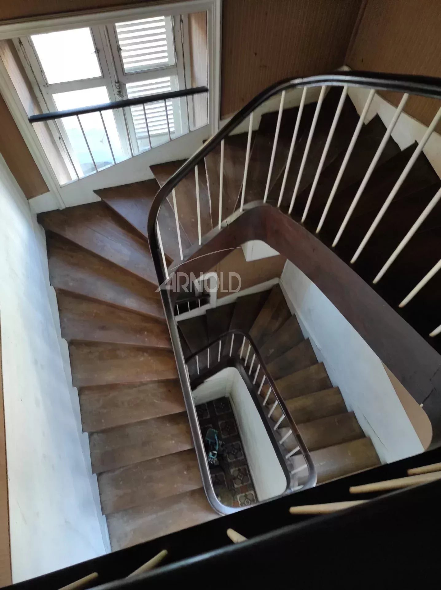 Staircase of a house to be renovated Wooden staircase in a bourgeois house to be renovated in Vannes.